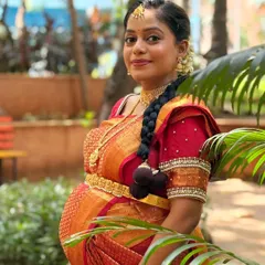 A beautiful, no-filter portrait of the mom-to-be, showcasing her natural glow. The makeup is kept fresh and radiant, perfect for this special celebration.