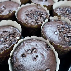 Rich and decadent chocolate muffins, packed with chocolate chips. These are perfect for a snack box or as part of a dessert spread for chocolate lovers.