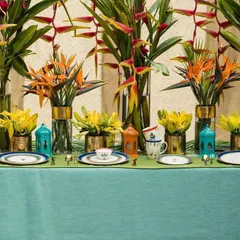 This tablescape was created for a professional photoshoot of KIKA's tropical dinnerware collection. I used a vibrant mix of tropical flowers and colorful lanterns to complement the product's theme, ensuring the styling was perfect for marketing and promotional materials.