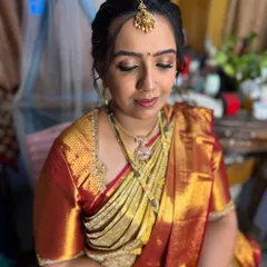 A close-up of the makeup for the naming ceremony. I created a soft, shimmery eye look with a warm lip color that photographed beautifully.