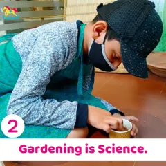 Gardening is science in action. This young learner is carefully preparing his pot, discovering firsthand how plants grow and what they need to survive.