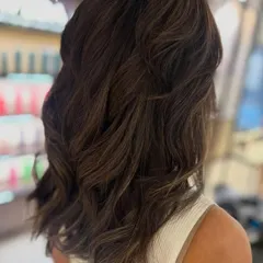 A fresh cut and color can make all the difference. I used classic highlights to add dimension and gave her a new haircut to complete this beautiful transformation.