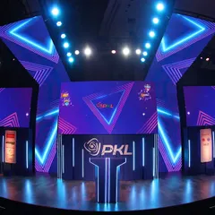 A full view of the impressive stage we designed and built for the PKL Player Auction. The geometric neon lighting and multiple LED screens create a modern and professional environment fit for a premier sports league.