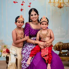 Capturing 'Yashoda' with her two little Krishnas was double the fun. We love accommodating siblings in our themed shoots to create a complete and heartwarming family memory.