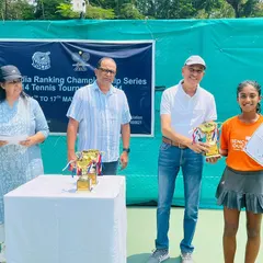 A proud moment at the awards ceremony. Our student Eshal Pathan receives her winner's trophy at the MSLTA All India Ranking Championship, a testament to her hard work and our training program.