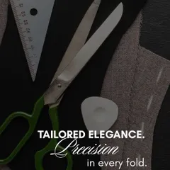 Tailored elegance lies in precision. This image captures the essential tools of our trade: the tailor's scissors, chalk, and measuring tools, symbolizing our commitment to meticulous craftsmanship.