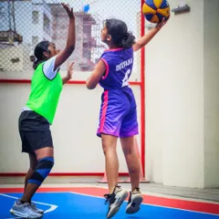 A player executes a perfect jump shot during a JBL game. I focus on developing strong fundamentals and creating opportunities for athletes to shine under pressure.