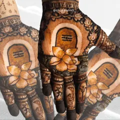Har Har Mahadev! This spiritual design features a Shivling with a lotus flower, perfect for the holy month of Shravan or for a devotee bride.