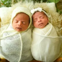 Double the love, double the joy. I have special experience in safely posing and photographing newborn twins, capturing their unique bond from the very beginning.