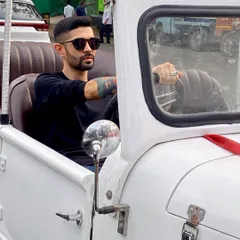 Arriving in style to get the baraat started. Whether it's a vintage car or a custom DJ truck, I make sure the procession is an event in itself.