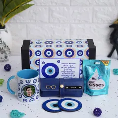 The Evil Eye Hamper can be personalized with a photo on the mug, making it a protective and personal gift for someone you care about.
