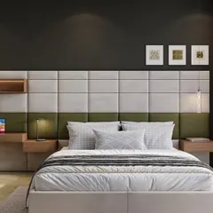 Functionality meets style in this bedroom, where the upholstered headboard extends to include a built-in desk and shelving. The two-tone color scheme adds visual interest without sacrificing the room's calm and organized feel.