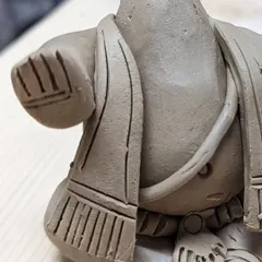 A close-up of a Ganesha sculpture in progress during a workshop. I teach students how to add small, expressive details to make their creations unique.