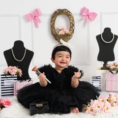 A little fashionista in the making. This fun and glamorous shoot with Chanel and Victoria's Secret props was a joy to create for this smiling baby girl.