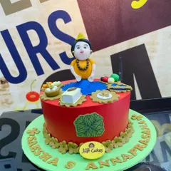 A custom 2kg cake designed for an Annaprasana ceremony, a baby's first rice-eating ritual. The cake features intricate fondant figures and elements representing the sacred occasion.