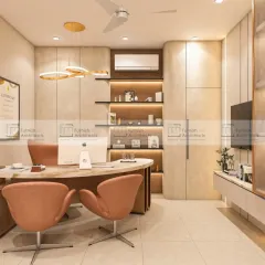 A doctor's cabin designed to be a sanctuary of calm and efficiency. The space uses neutral tones, soft textures, and statement furniture to ensure patient comfort and foster productivity.