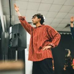 A candid shot captured during a 'Raanjhanaa' workshop. A moment of focus and emotion before the movement begins.