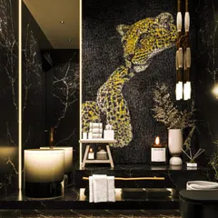 For this powder bathroom, we embraced a bold and dramatic theme. The space is enveloped in black Marquina marble, with a custom leopard mosaic art piece serving as a stunning focal point, demonstrating our ability to integrate bespoke art into our designs.