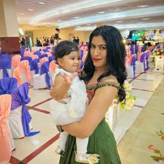 A heartwarming transformation. We took our client's mother's traditional saree and repurposed it into this stylish off-shoulder crop top and pleated lehenga skirt. It’s a beautiful way to honor family heritage while creating a new, modern look.