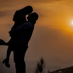 A perfect silhouette against the golden hour sun, capturing the pure romance and intimacy of a couple's connection. I live for these magical sunset moments in the hills.