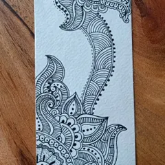 The bottom half of the same henna-style bookmark, showing the continuation of the detailed, flowing floral and paisley patterns.
