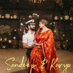 A themed shoot with a naval officer uniform, creating a unique story under a beautiful chandelier.