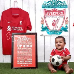 For the future football star, we offer a Liverpool FC themed photoshoot. We create an authentic Anfield atmosphere with the team jersey, crest, and a football, perfect for capturing your little fan's passion.