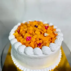 I'm obsessed with mangoes and just can't get enough. This is my Mango Vanilla Gateau, topped with fresh mangoes and a few edible flowers for a pretty touch.