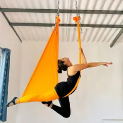 Discover the freedom of flight in our Aerial Yoga classes. This beautiful pose combines grace, strength, and flexibility, allowing you to explore movement in a completely new way.