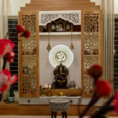 We take great pride in creating sacred spaces that blend tradition with timeless design. This pooja unit is a testament to our craftsmanship, featuring intricate jali work, a backlit 'Om' centerpiece, and dedicated niches for idols, creating a corner of divine elegance and peace.
