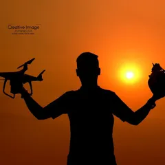 A silhouette of me against a golden sunset, holding my two essential tools: a DJI drone and my Sony camera. This shot represents my passion for both aerial and ground-level event photography.