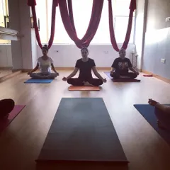 Ending a fun-filled private aerial party with a moment of calm. After all the flying and laughing, we take time to sit in meditation and soak in the good vibes.