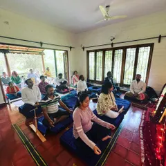 A view of our Christmas meditation retreat, where devotees gathered to dive deep into their practice. The open doors welcome the serenity of nature, blending the inner and outer worlds into a single, peaceful experience of stillness and community.