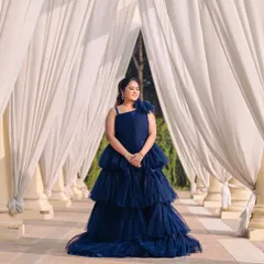 Another angle of the pre-wedding look, showcasing the elegant gown and the soft, romantic makeup that enhances her natural features for the camera.