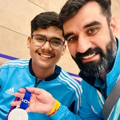 Celebrating a hard-earned Silver medal. Every victory, big or small, is a step forward and a moment of great pride for us and the athlete.