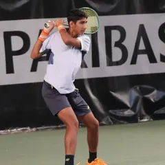 Tavish Pahwa executing a powerful backhand during the U16 European Junior Tour Category 3 event in France. Training on European clay is an invaluable experience for our players.