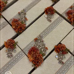 A collection of my bespoke trousseau boxes, laid out to showcase their intricate embellishments. The combination of textured fabric, silver gota patti, and floral details is simply breathtaking.