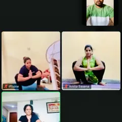 A snapshot from one of our live online group yoga classes. Even through a screen, I make sure to observe everyone's posture, like in this Malasana (Garland Pose), to provide personal corrections and build a strong virtual community.