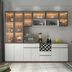 A versatile storage unit perfect for a dining area. It combines a crockery cabinet with a built-in wine rack and a countertop space for a microwave or coffee machine.