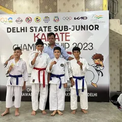 Abir Chugh with his well-earned silver medals in both kata and kumite. His performance demonstrates the balanced skill set we strive to develop in all our students.
