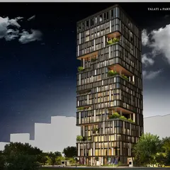 A night view of the Bandra commercial tower, where integrated landscape decks on every level offer professionals immersive breakout zones. These spaces provide sweeping views of the skyline, the serene Bandra Talao, and the iconic sea link.