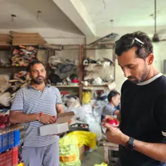 The right equipment is crucial. Here I am in Meerut, the hub of cricket gear, personally inspecting the quality of cricket balls. I believe in going the extra mile to provide the best for my players.