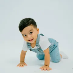 Crawling into a world full of smiles and adventures! This shot captures the determination and excitement of a baby on the move.