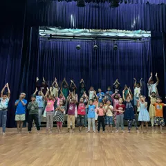 Young participants of our Ramana Summer Camp on stage at the Heritage Auditorium. We nurture cultural values and self-awareness from a young age, providing every child with the opportunity to perform and express themselves with confidence.