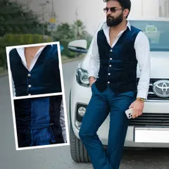 For a smart, semi-formal look, I designed this textured blue velvet waistcoat. It's perfect for layering over a crisp white shirt, offering a touch of elegance and personal style.