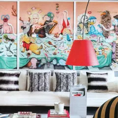 A close-up from the Livingetc spread, showing the vibrant art and iconic furniture that define Project 86.