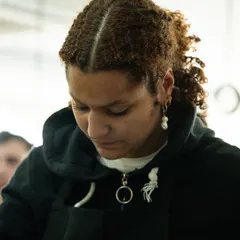 Deep concentration from a UNISG student during a practical session.