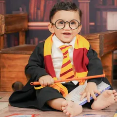 For the little wizards in training, my Harry Potter theme is always a magical choice. I provide the costume, props, and the library backdrop to bring the enchantment to life.