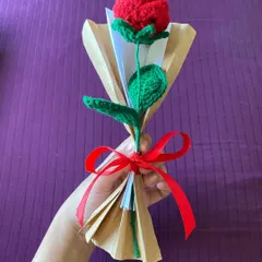 Our single crochet rose is a classic romantic gesture. It comes wrapped in craft paper with a red ribbon, making it a perfect, thoughtful gift for someone special.