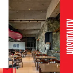 This image highlights the hospitality focus of the Radisson Resort project. The design uses local stone and warm wood to create inviting spaces that feel both luxurious and deeply connected to the Lonavala landscape.